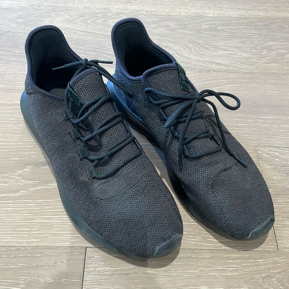 Men’s black Adidas tubular running shoes size 11.5